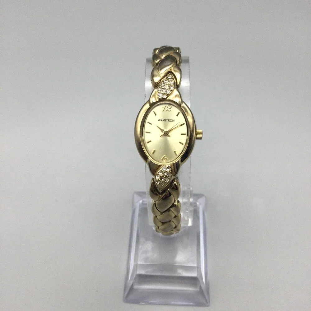 Armitron Womens Watch 19mm Gold Tone Oval Braided Bracelet New Battery 7
